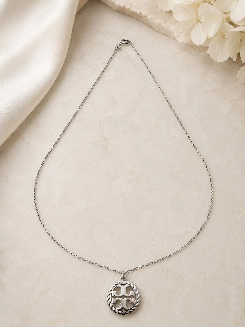 Tory Burch elegant silver